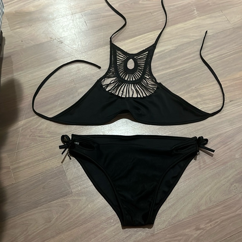 Black bikini, size medium. Worn twice. No brand.